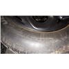 Image 2 : SET OF 4 ULTRA GRIP GOOD YEAR 215/65R15 TIRES ON 5 BOLT RIMS AND 17 INCH RIM COVERS