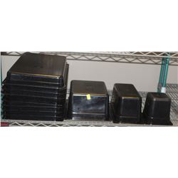 SHELF OF ASSORTED SIZE BLACK INSERTS