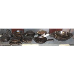 SHELF OF ASSORTED CAST IRON PANS, WOKS, KETTLES