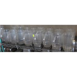 SHELF OF PLASTIC BEER JUGS