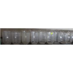 SHELF OF PLASTIC BEER JUGS