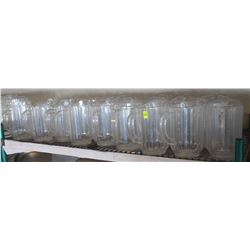 SHELF OF PLASTIC BEER JUGS