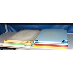 SHELF OF 11 ASSORTED COLOR CUTTING BOARDS