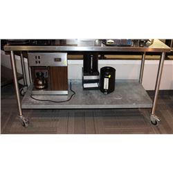 STAINLESS STEEL TABLE ON CASTORS  W/ BACKSPLASH