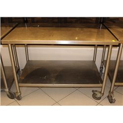 5 FT STAINLESS STEEL TABLE ON CASTORS