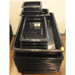 STACK OF ASSORTED BLACK PLASTIC FOOD INSERTS