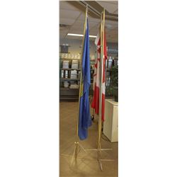 LOT OF 3 STANDING FLAG POLES WITH 2 FLAGS AND