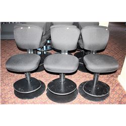 3 BLACK SWIVELING CUSHION CHAIRS W/ FOOTRAIL