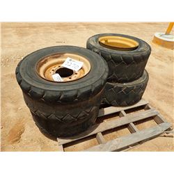 (4) 12-16.5 NHS TIRES W/RIMS (B-8)