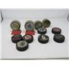 Image 1 : LOT OF 11 HOCKEY PUCKS (TORONTO MAPLE LEAFS, WINNIPEG JETS, ETC)