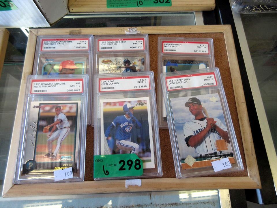 Six Graded Baseball Trading Cards in Hard Cases