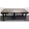 Image 1 : Square oak dining table on ringed and fluted legs;