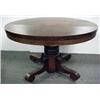 Image 1 : Round oak dining table with pedestal base and C-sc