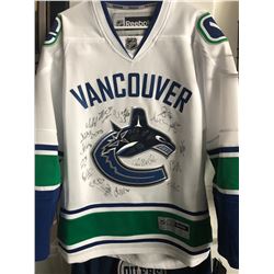 VANCOUVER CANUCKS TEAM SIGNED HOME JERSEY (JSA COA) W/  HORVAT/ BROCK BOESSER/ DANIEL & HENRIK SEDIN