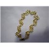 Image 2 : DOLPHIN BRACELET STAMPED 14K