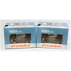 TWO H6054 JEEP HEADLIGHTS.