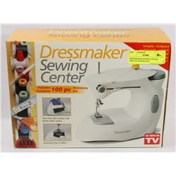 DRESSMAKER SEWING CENTER 100PC ACCESSORY KIT.