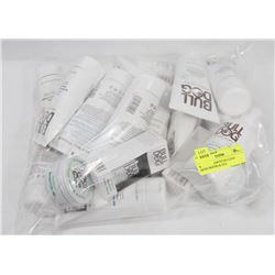 BAG OF ASSORTED BULLDOG MOISTURIZERS & OILS.