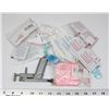 Image 1 : PIERCING GUN WITH EARRINGS IN BAG