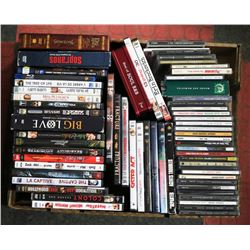 FLAT OF APPROX 29 DVDS & 30 CDS.
