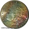 Image 1 : 1884-CC  MS67 NGC. Wide swaths of rainbow iride