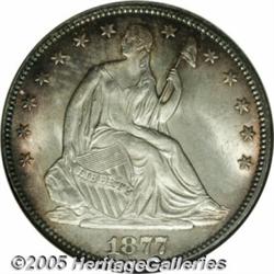 1877 50C MS65 NGC. Toned with dark blue and gold 