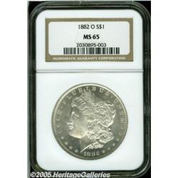 1882-O $1 MS65 NGC. White lustrous surfaces are h