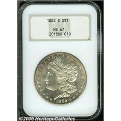 1882-S $1 MS67 NGC. Whispers of lilac and golden-