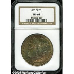 1883-CC $1 MS66 NGC. Multicolored toning takes on