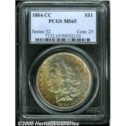 1884-CC $1 MS65 PCGS. Fully struck with emerald-g