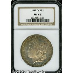 1885-CC $1 MS65 NGC. Varying shades of champagne-