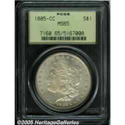 1885-CC $1 MS65 PCGS. A lightly toned and highly 