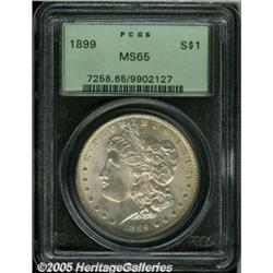 1899 $1 MS65 PCGS. A thin veil of light gold colo