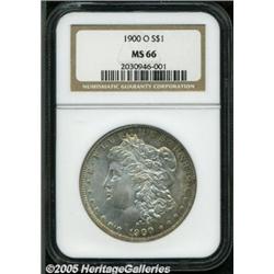 1900-O $1 MS66 NGC. Wisps of light reddish-brown 