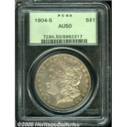 1904-S $1 AU50 PCGS. Golden-brown and powder-blue