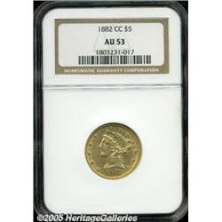 1882-CC $5 AU53 NGC. Warm honey-gold surfaces dis