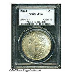 1889-O S$1 MS64 PCGS. Beautifully toned in aquama