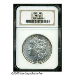 1892 S$1 MS64 NGC. Freckles of golden-russet pati