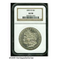 1892-CC S$1 AU58 NGC. With overall sharp definiti