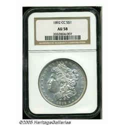 1892-CC S$1 AU58 NGC. The mint luster is virtuall