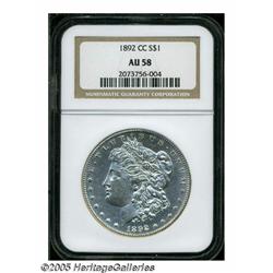 1892-CC S$1 AU58 NGC. A whisper of wear above the