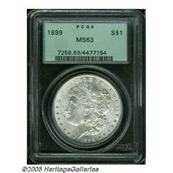 1899 S$1 MS63 PCGS. Silver-gray surfaces reveal n