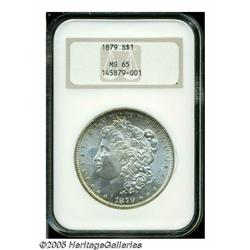 1879 S$1 MS65 NGC. With a business strike mintage