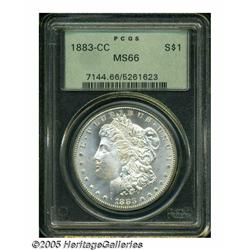 1883-CC S$1 MS66 PCGS. A nearly untoned semi-proo