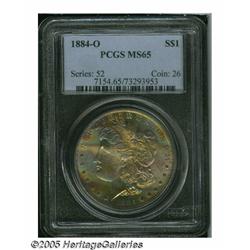1884-O S$1 MS65 PCGS. Lustrous surfaces are bathe