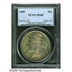 1889 S$1 MS65 PCGS. Well struck and vibrantly lus