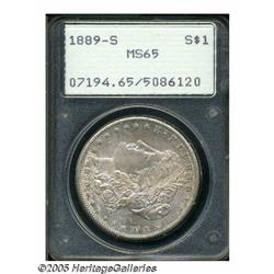 1889-S S$1 MS65 PCGS. Peach, cream-gray, and lave