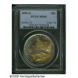 1899-O S$1 MS65 PCGS. Pastel yellow-gold, cobalt-