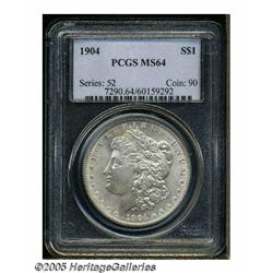 1904 S$1 MS64 PCGS. Boldly struck and lightly ton