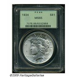 1934 S$1 MS65 PCGS. A nearly brilliant Gem that h